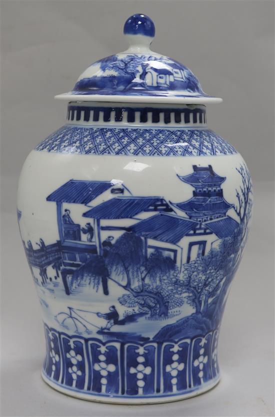 A late 19th century Chinese blue and white lidded baluster vase